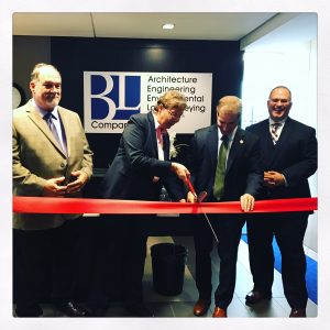 Carolyn Stanworth (BL's President & CEO) cuts the ribbon with the assistance of Mayor of Hartford, Luke Bronin